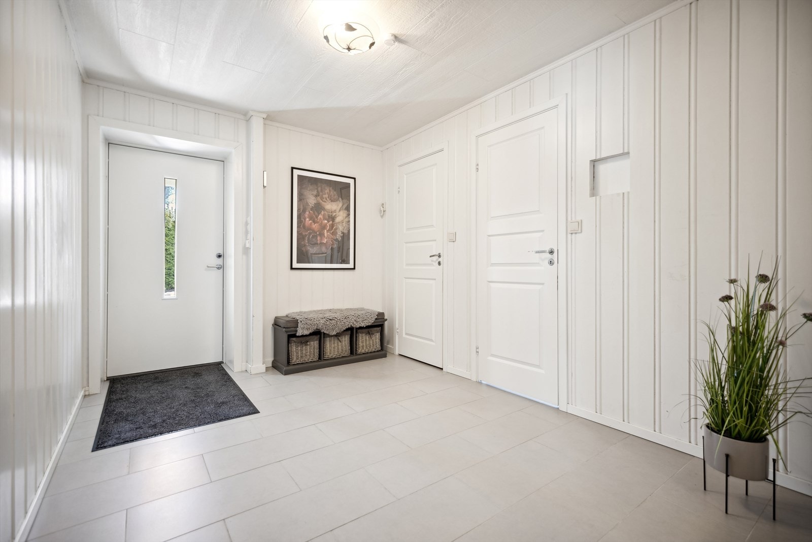 Flisene på gulvet beskytter mot smuss og søl. Galleribilde