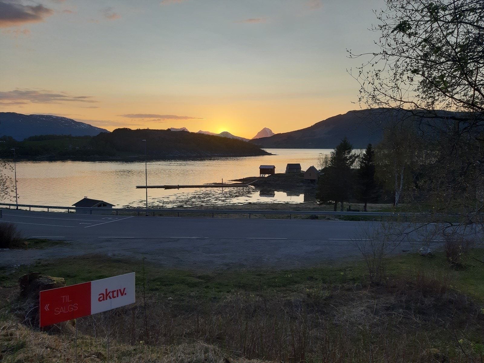 Solnedgang over Tomma Galleribilde