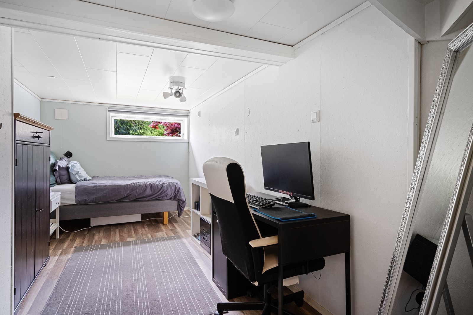 Med hvitmalte vegger er det enkelt å sette sitt eget preg på rommene. Galleribilde