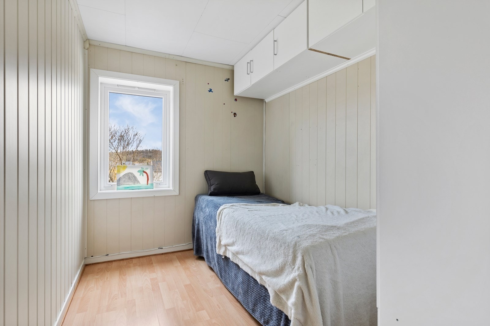 Ett av leilighetens tre soverom Galleribilde