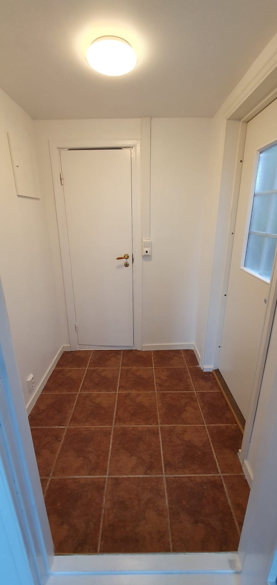 Flislagt Entre sett fra stuedøra Galleribilde