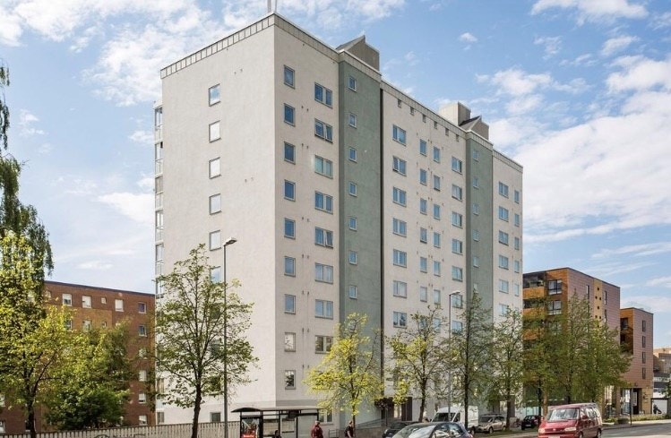 Leiligheten ligger i 7. etasje på baksiden av dette bildet Galleribilde