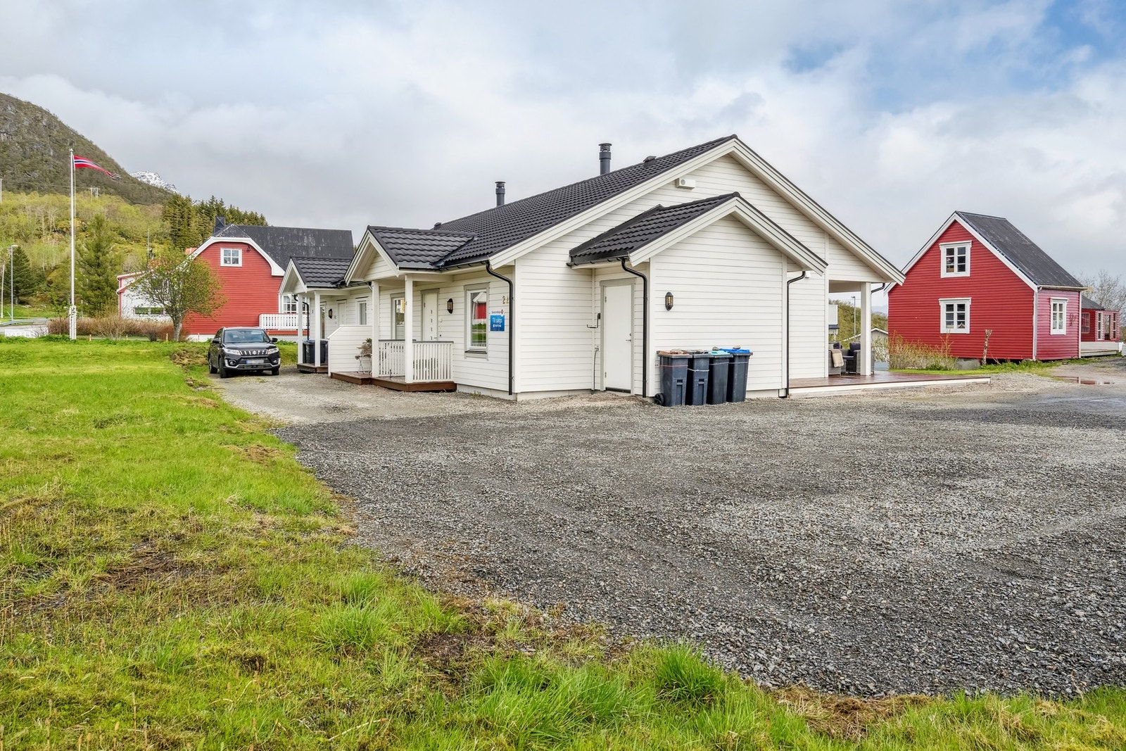 God plass til parkering på felles tomt. Galleribilde