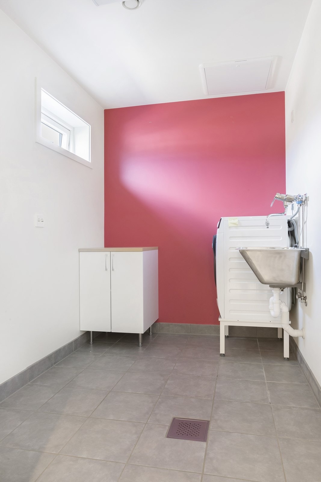 Praktisk vaskerom med gulvvarme Galleribilde