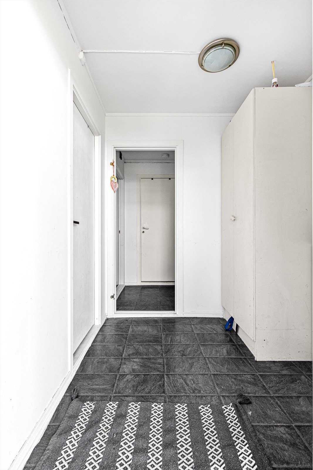 Gangen fungerer som en forbindelse mellom ulike rom Galleribilde