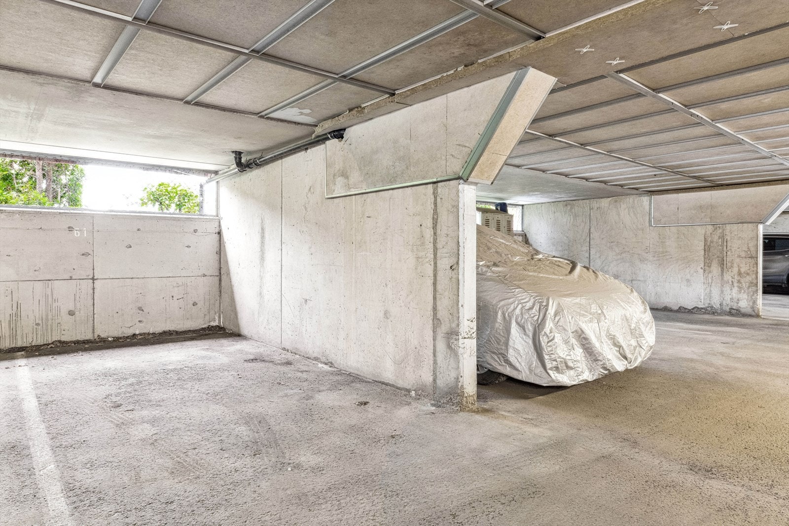 Det medfølger en parkeringsplass i felles parkeringskjeller. Galleribilde