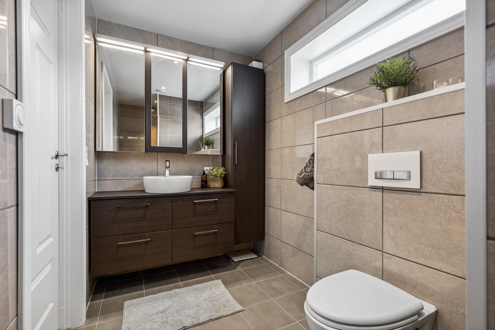 Badet har et eksklusivt preg og bygger opp under hverdagsluksusen. Galleribilde