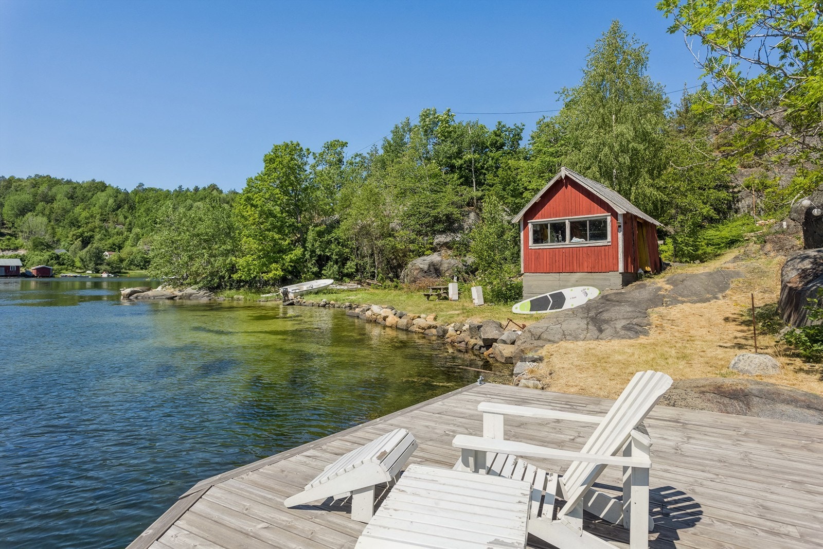 Egen brygge og sandstrand Galleribilde