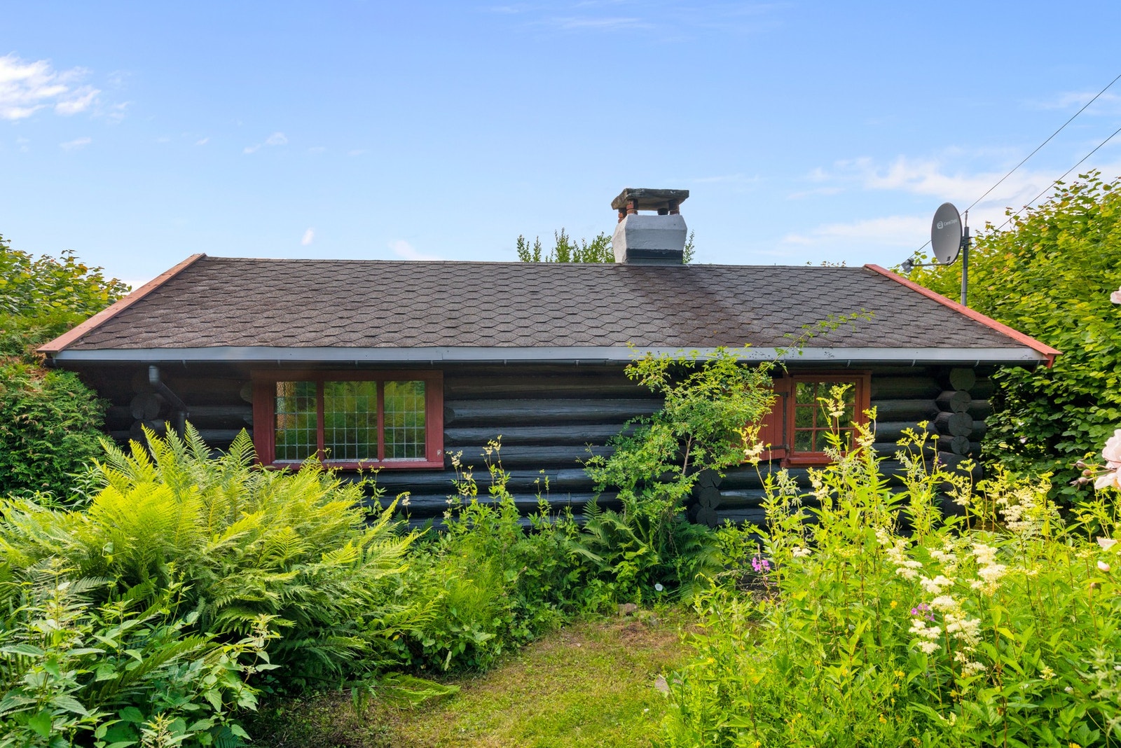 Liten tømmerhytte på 38 kvm. Galleribilde