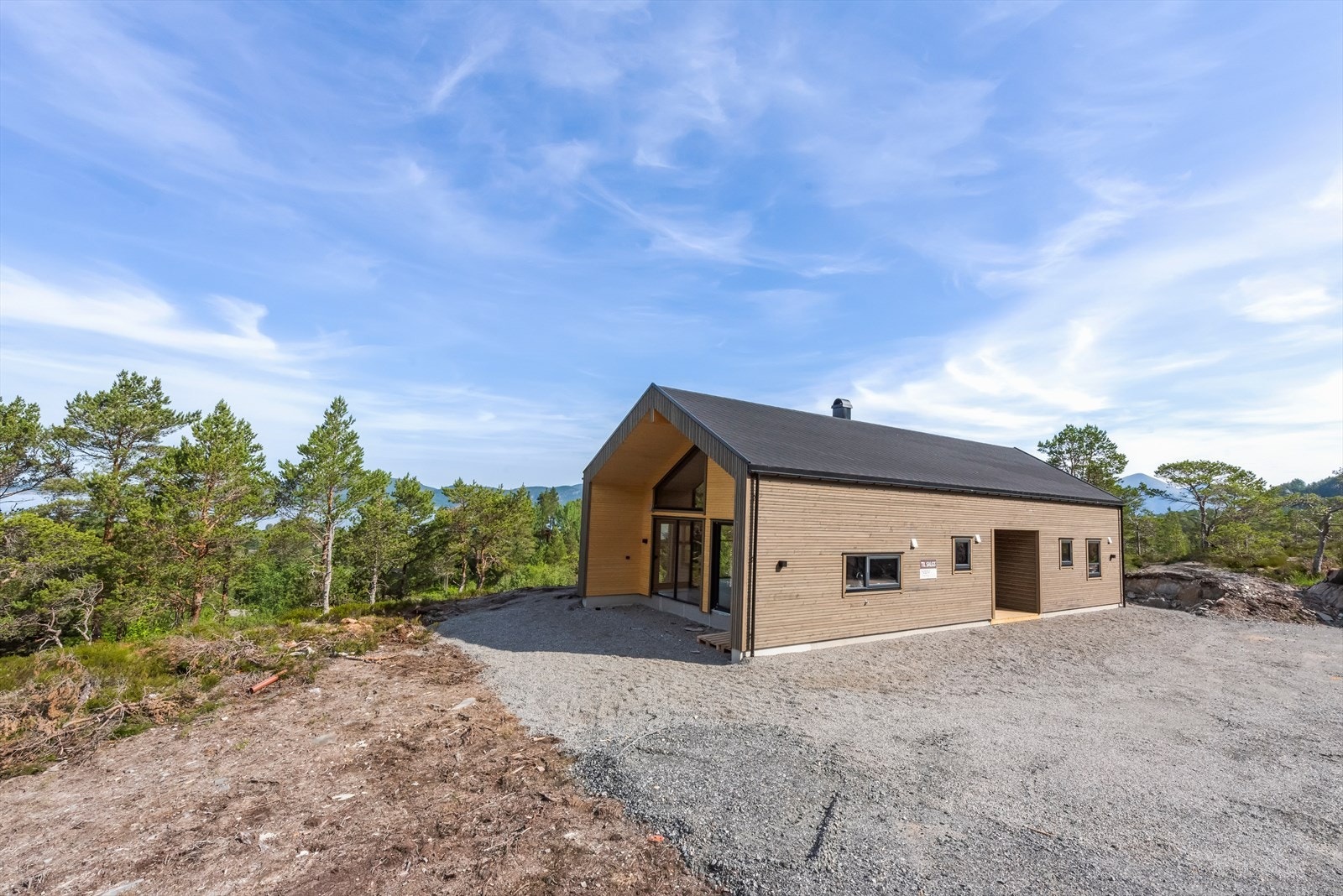 Gårdsplass med gode parkeringsmuligheter og muligheter for personlige tilpasninger Galleribilde