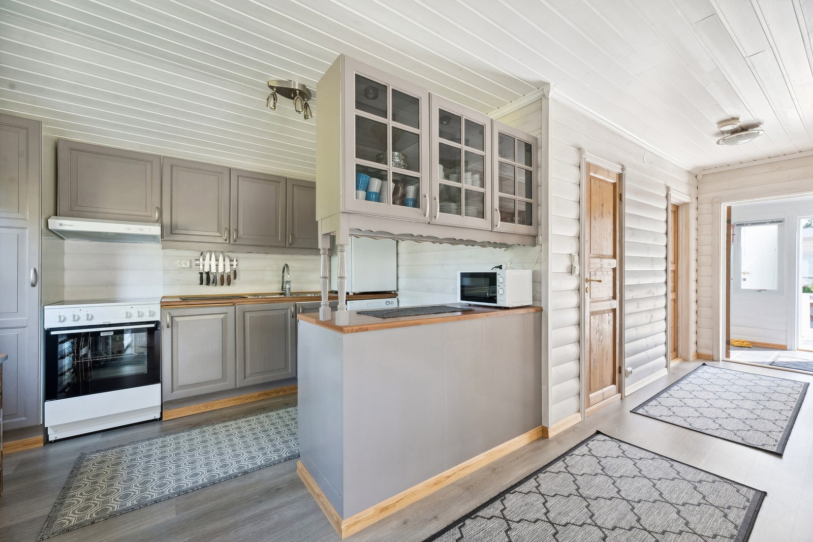 Stue og kjøkken i åpen løsning Galleribilde