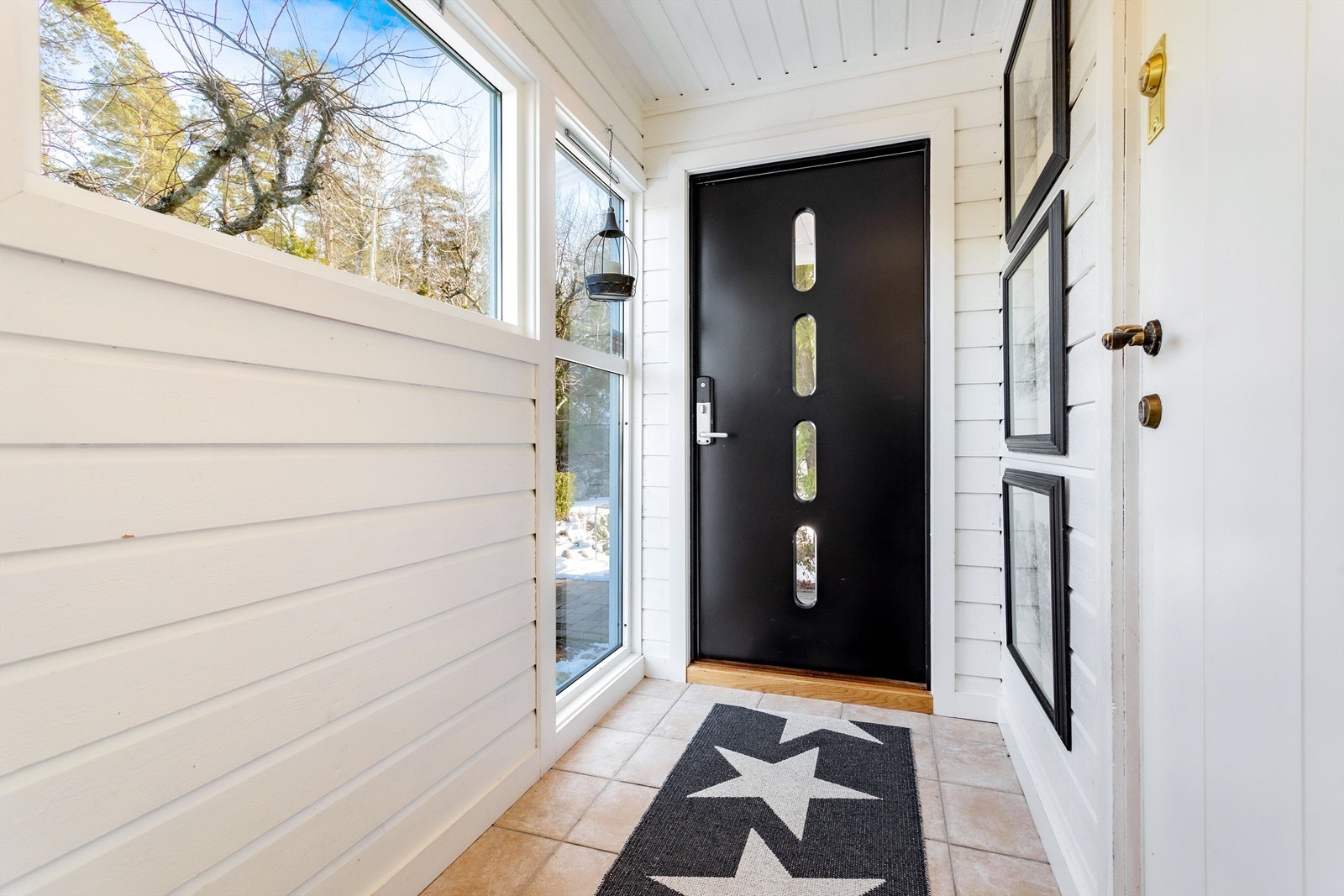 En lys og hyggelig yttergang Galleribilde