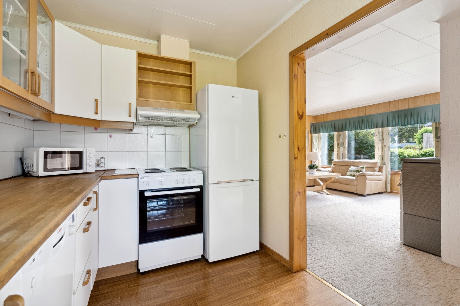 Delvis åpen stue og kjøkkenløsning Galleribilde