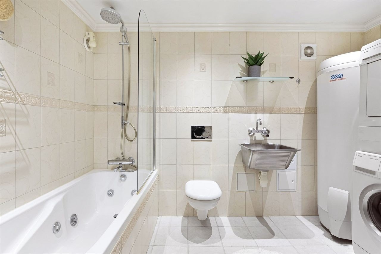 Flislagt bad med varmekabler Galleribilde