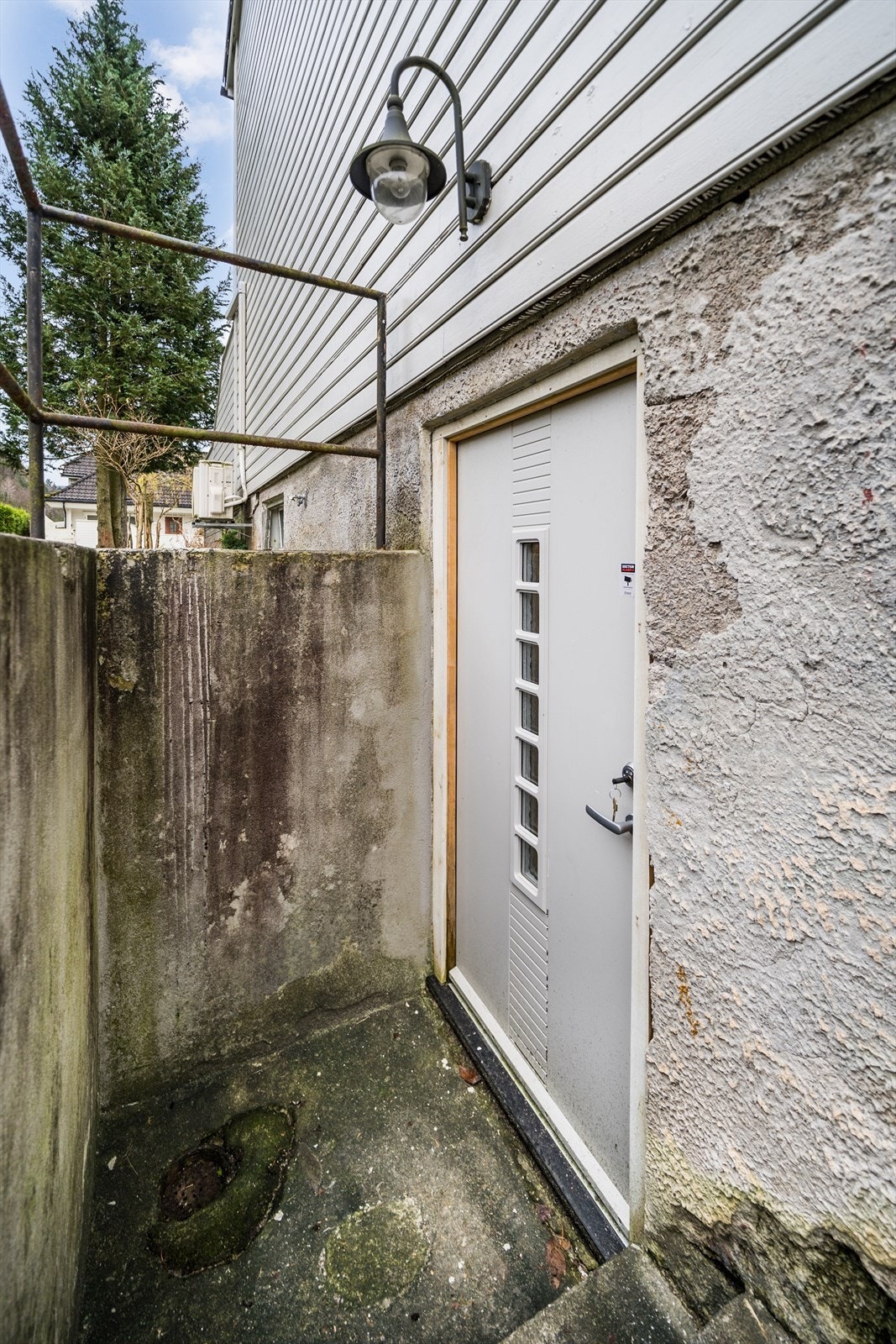 Bi-inngang kjelleretasjen Galleribilde