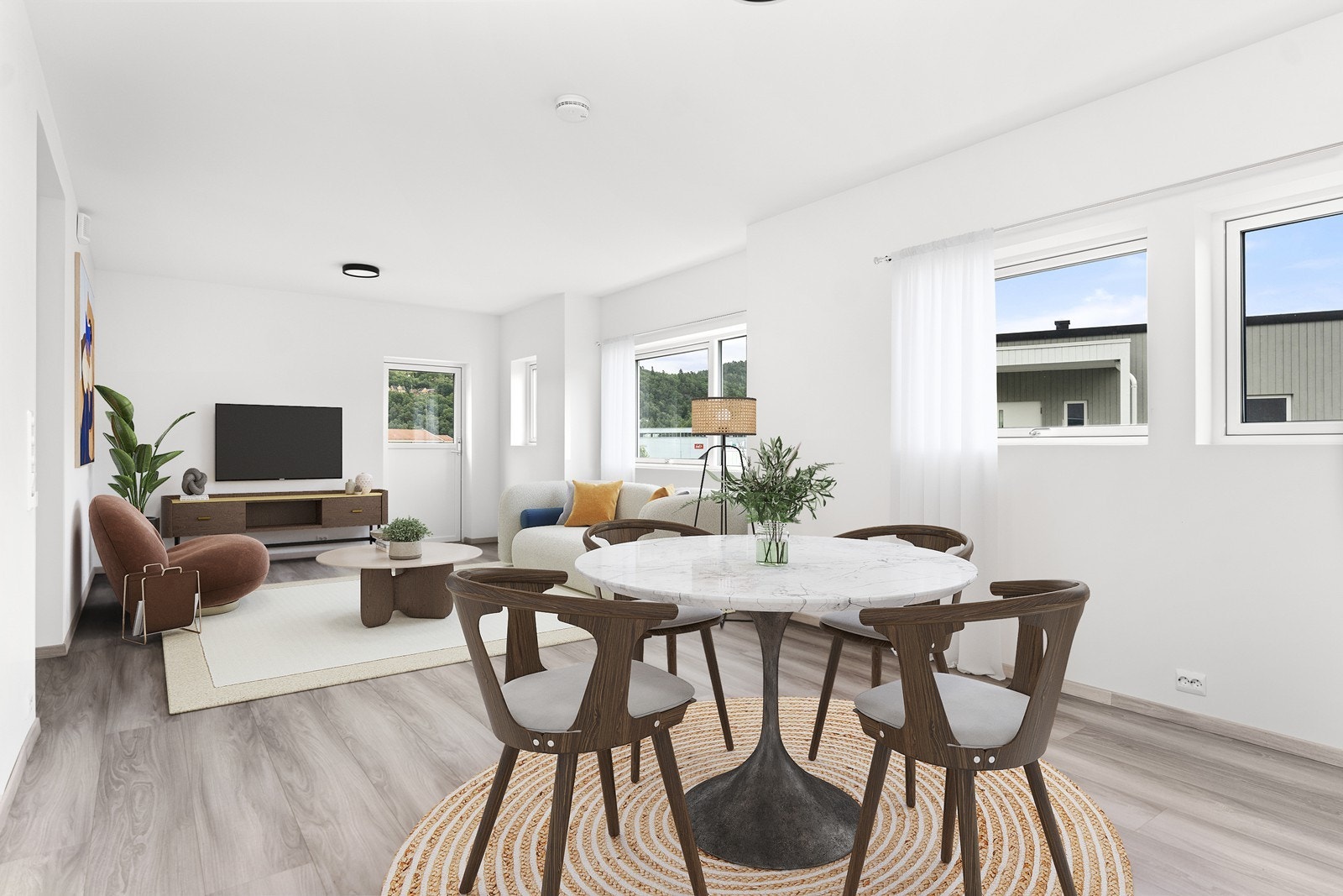 Stua/ kjøkken er romslig og lys. Boligen er ikke pr idag uinnredet, dette er bare et forslag til møblering Galleribilde