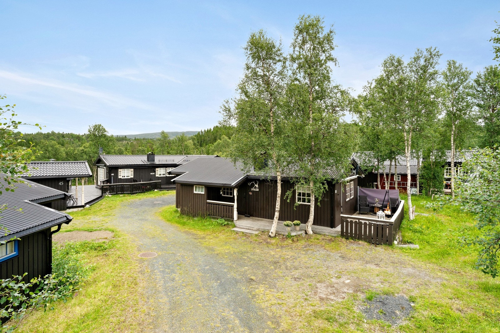 Sjarmerende fritidsbolig i etablert og hyggelig hyttefelt i Stugudal, rett bak Væktarstua. Galleribilde