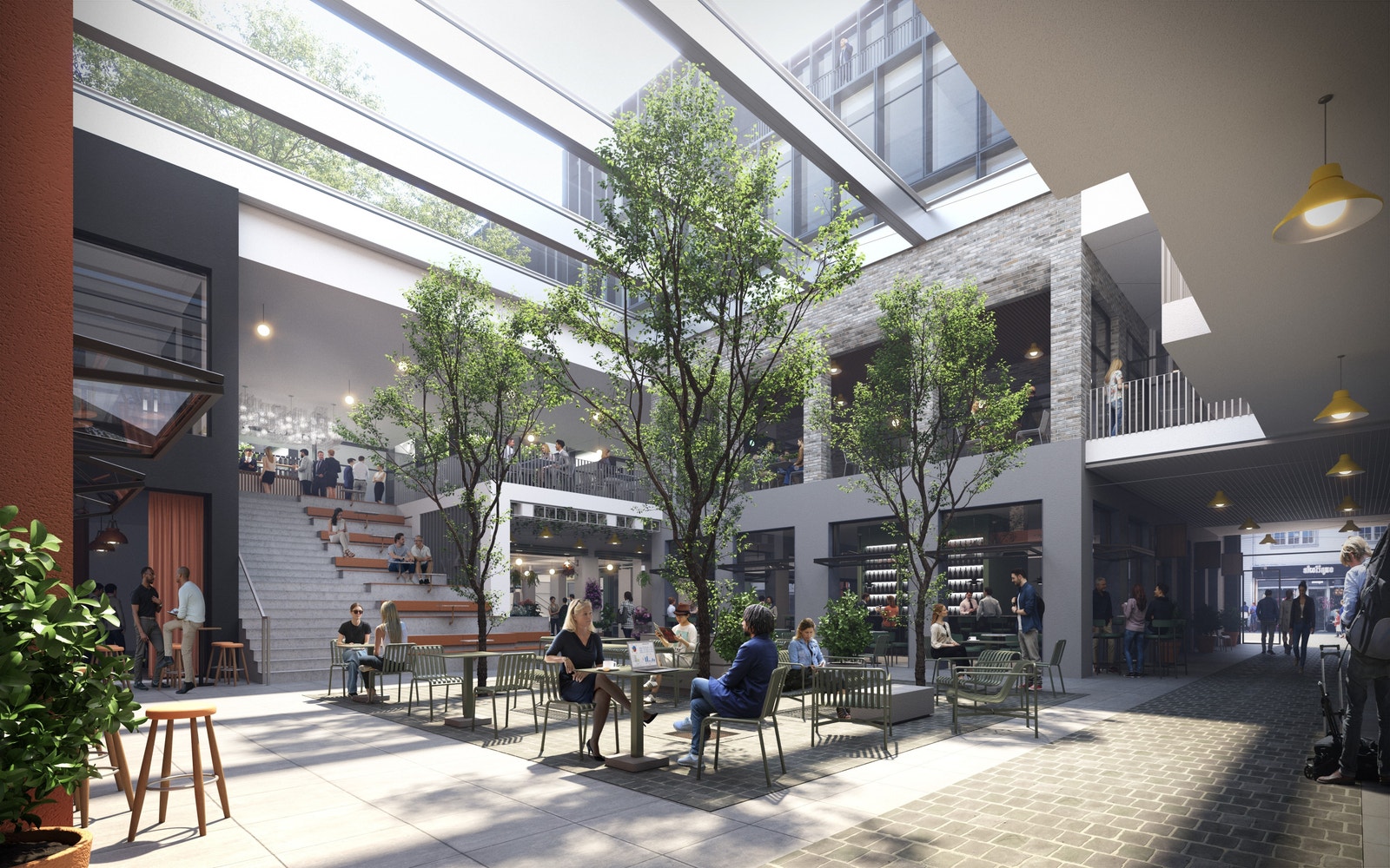 Et pulserende "bytorv" blir byggets hjerte; med dagslys fra et generøst glasstak blir det et godt sted å være. Galleribilde