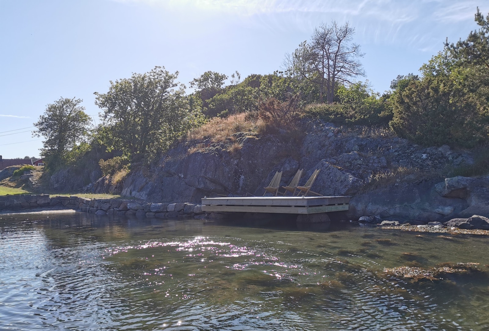 Brygge. Liten strand til venstre Galleribilde