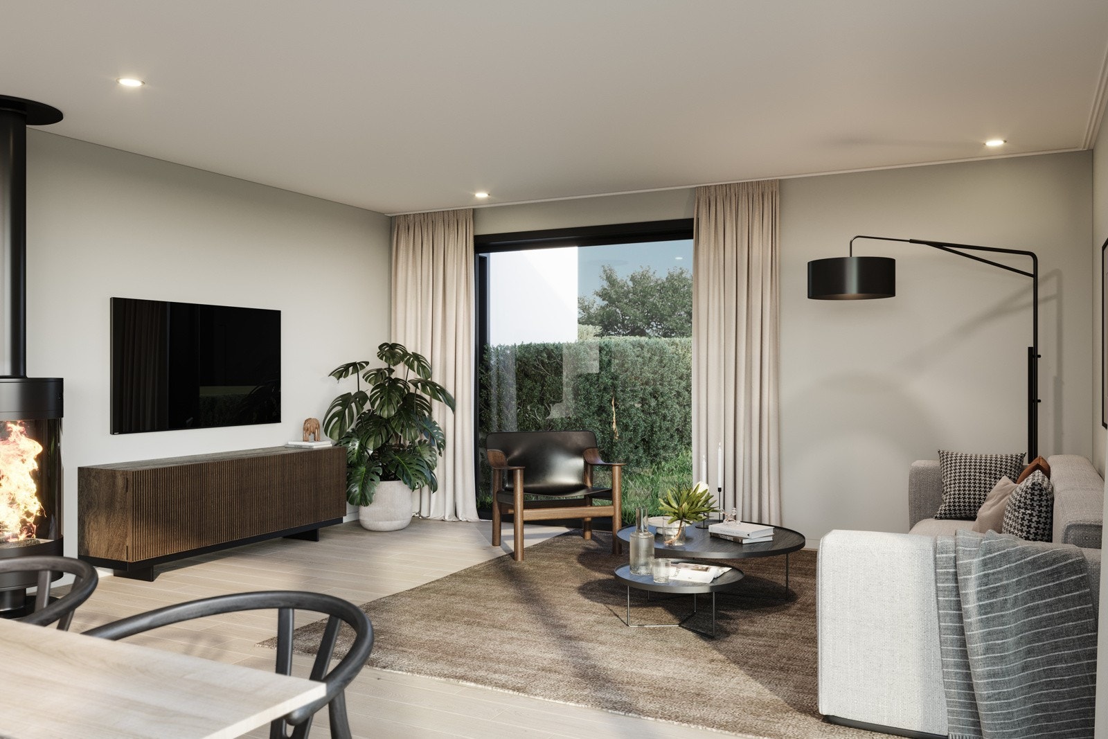 Spisestuedelen har glass skyvedør som fører ut til hagen. Gulvet har enstavs parkett i utførelse hvitoljet eik, tak og vegger er malt i fargen Grå Harmoni Galleribilde