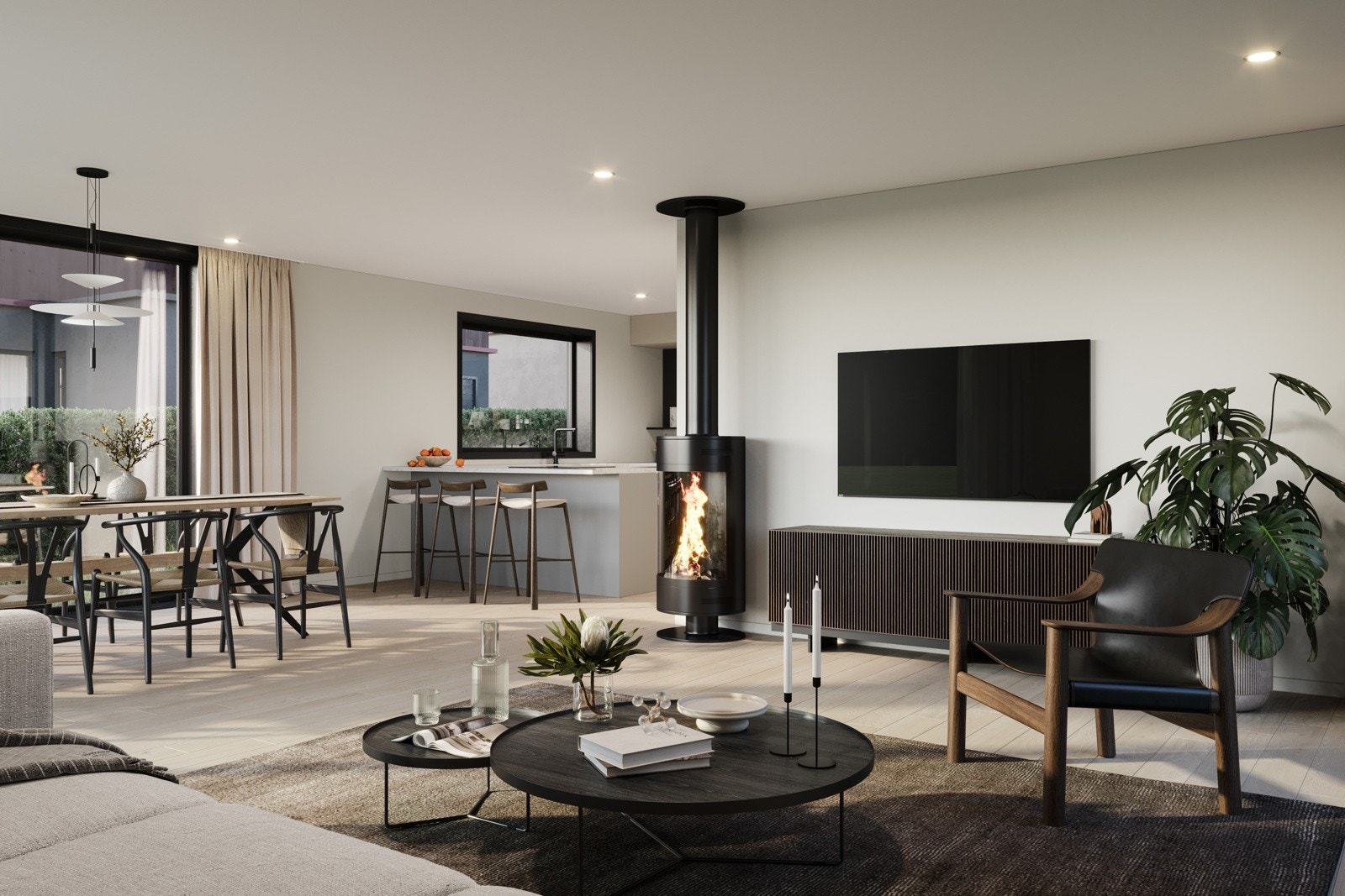 Boligene har stue, spisestue og kjøkken i åpen løsning på hele 50 kvm i første etasje - et nydelig rom med store vindusflater på tre sider Galleribilde