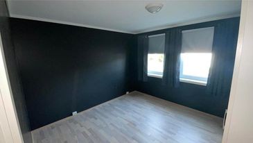 Hoved soverom med lystette rullegardiner og gardiner Galleribilde