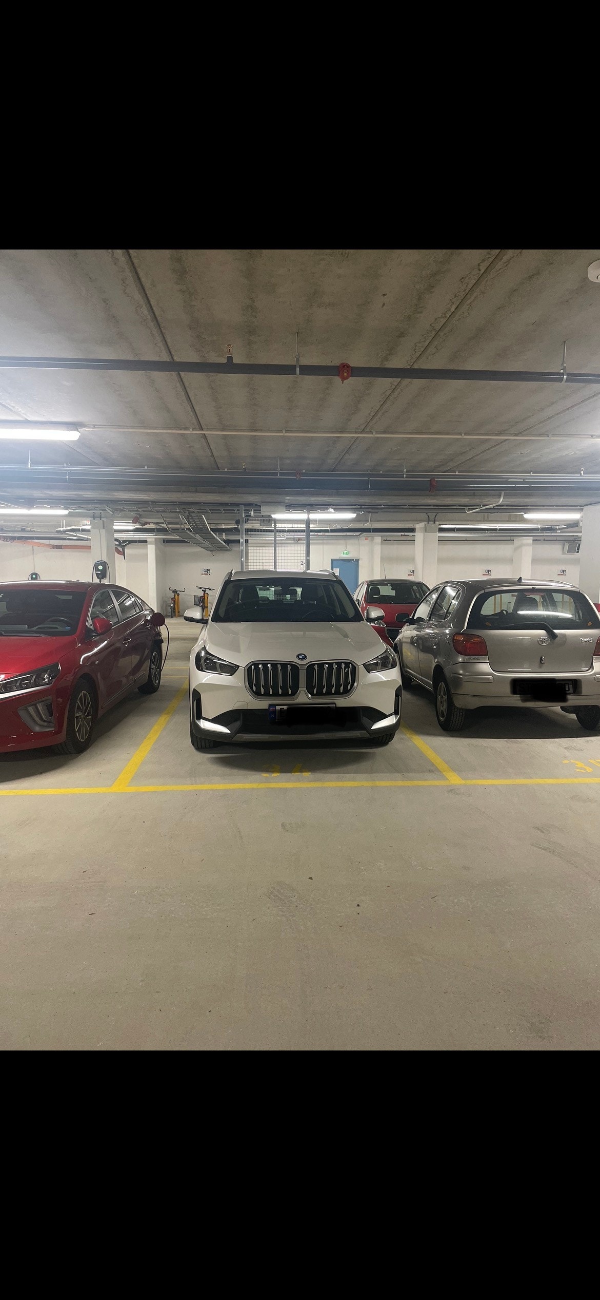 Parkeringen i midten Galleribilde