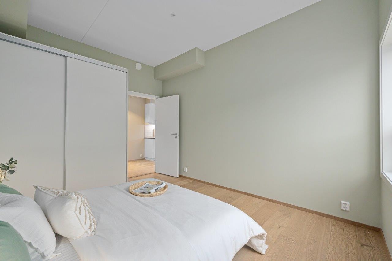 Duse delikate interiørfarver i hele leiligheten Galleribilde