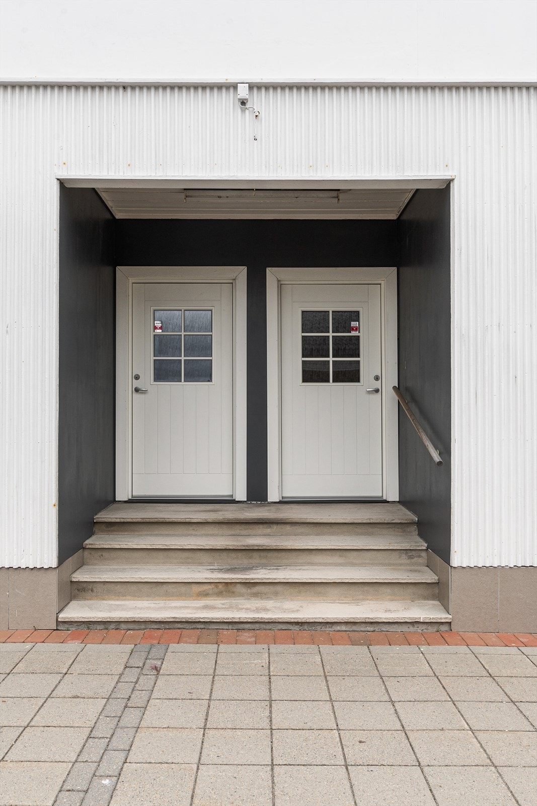 Inngangspartiet til begge butikkene. Galleribilde