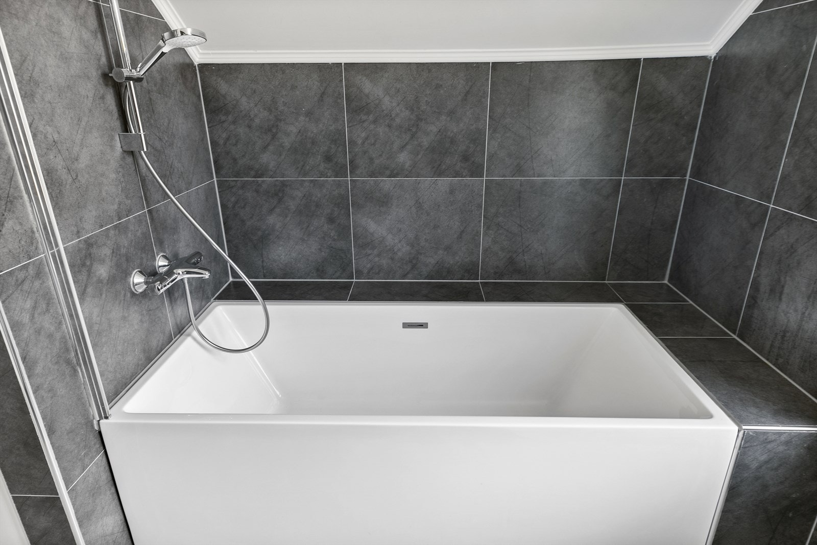 Nyt et godt og varmt bad en vinterdag. Galleribilde