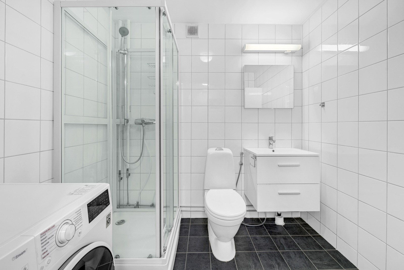 Flislagt bad med gulvvarme. Galleribilde