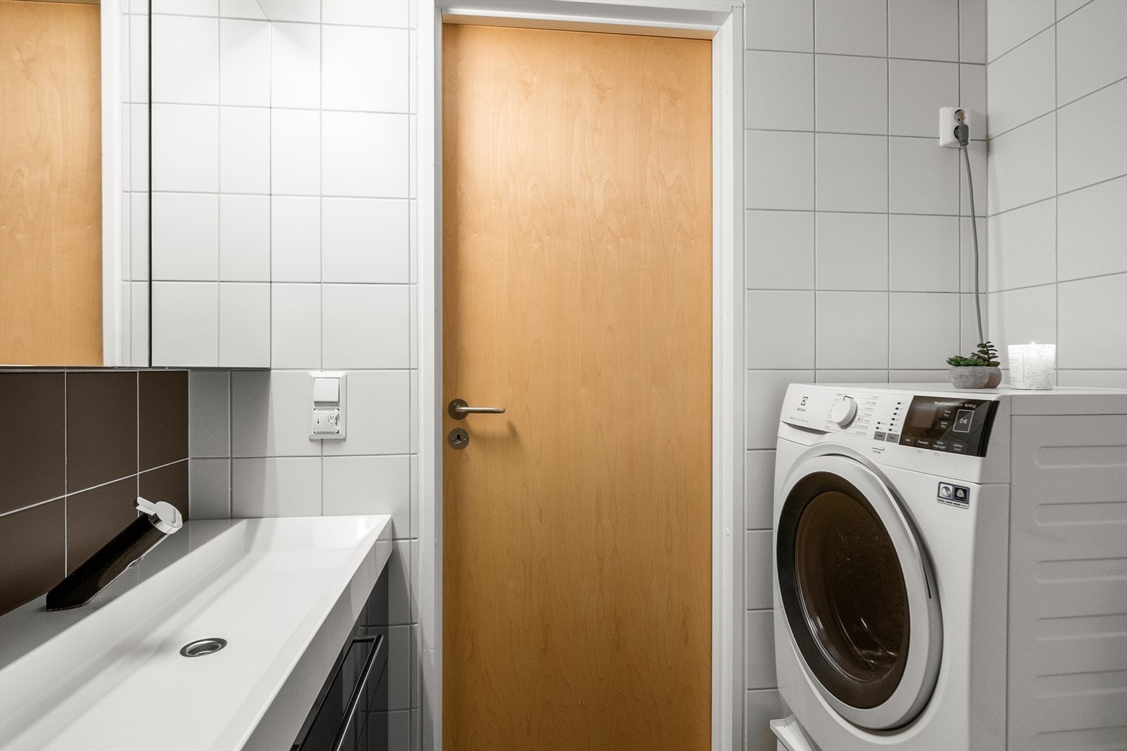 Opplegg for vaskemaskin på badet Galleribilde