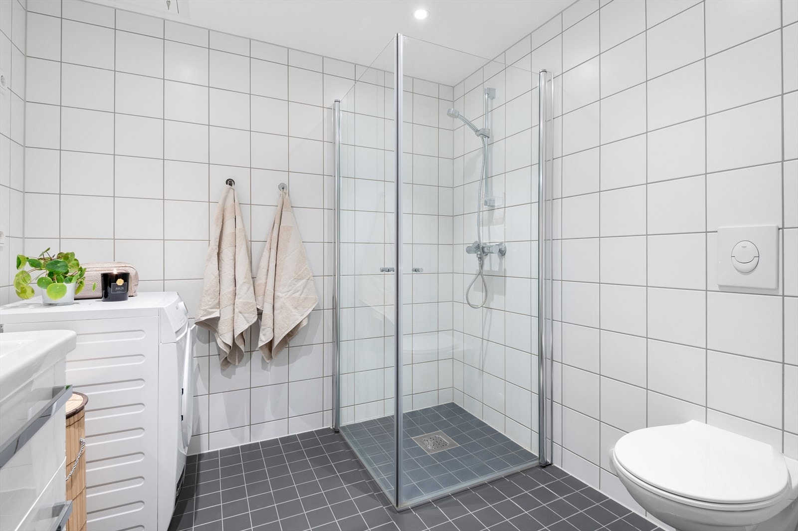Badet har opplegg til vaskemaskin. Galleribilde