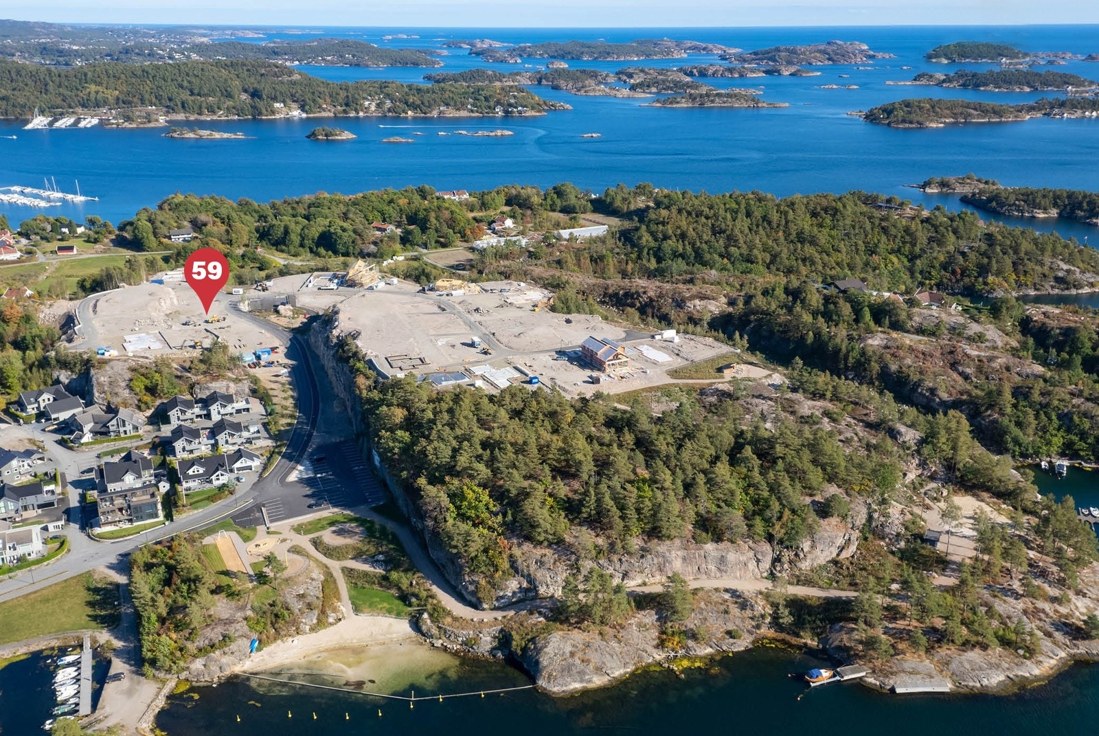 Tomten markert på oversiktsfoto Galleribilde