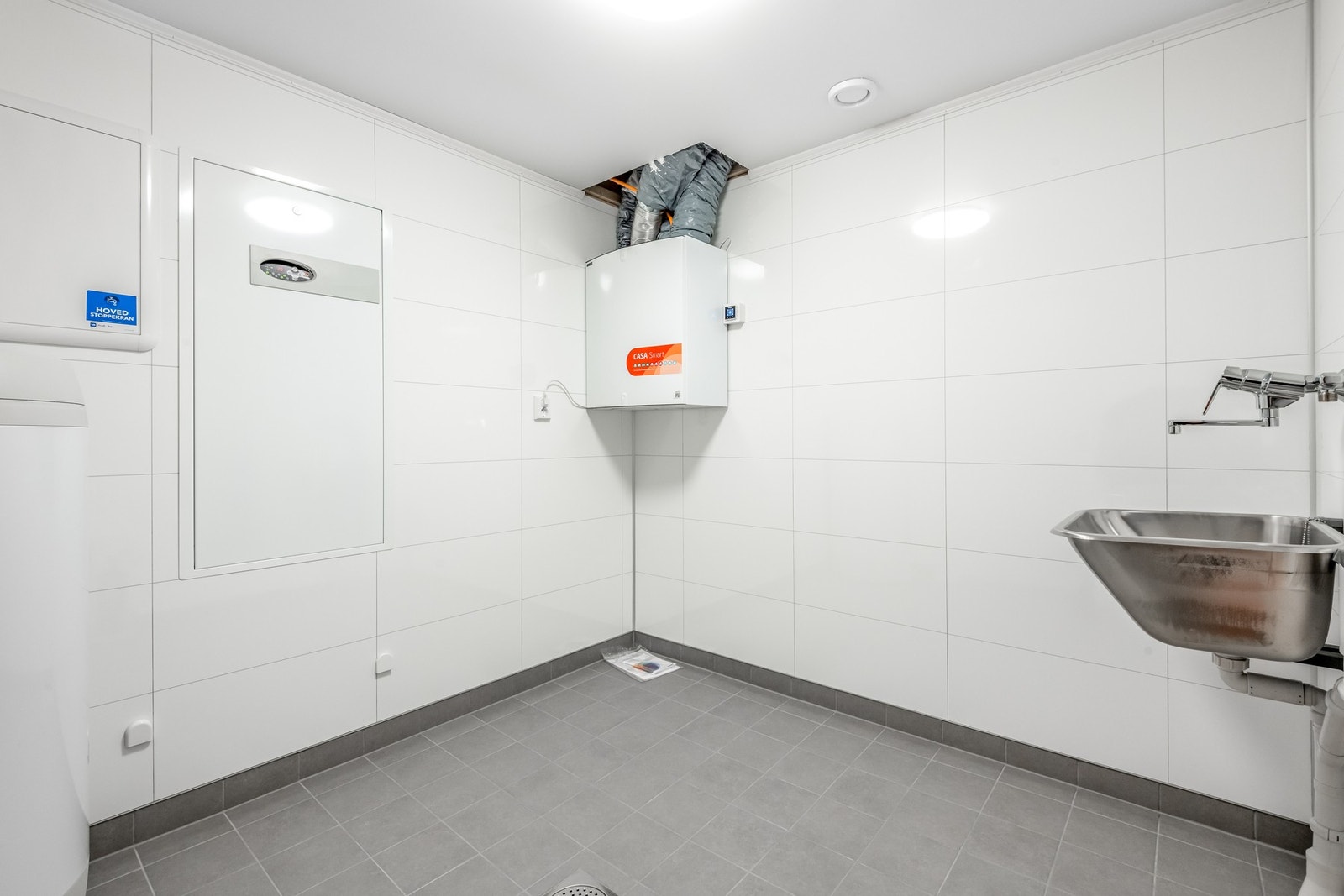 Leiligheten har eget og praktisk vaskerom. Galleribilde