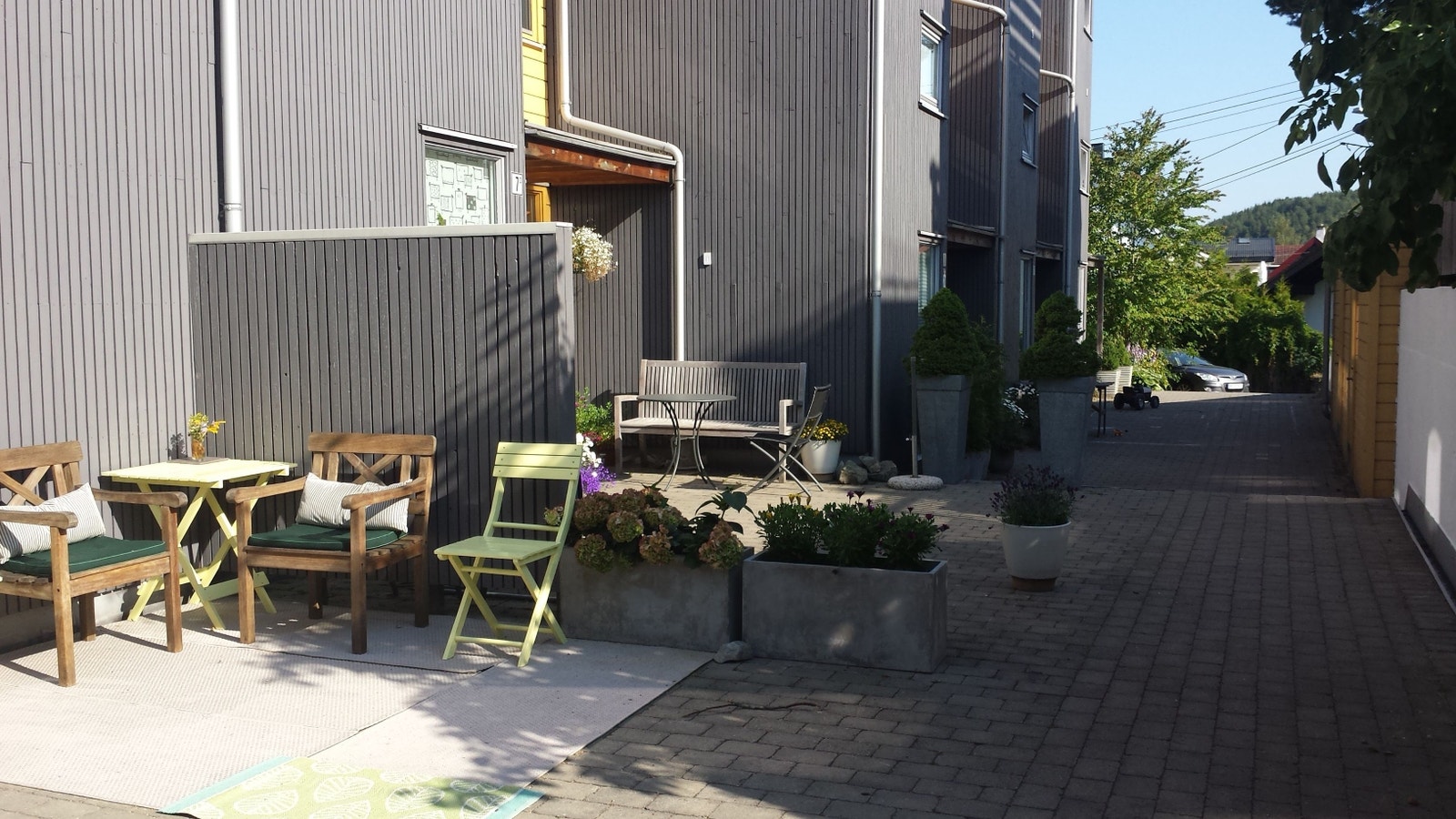 Huset ligger innerst i sameiet Galleribilde