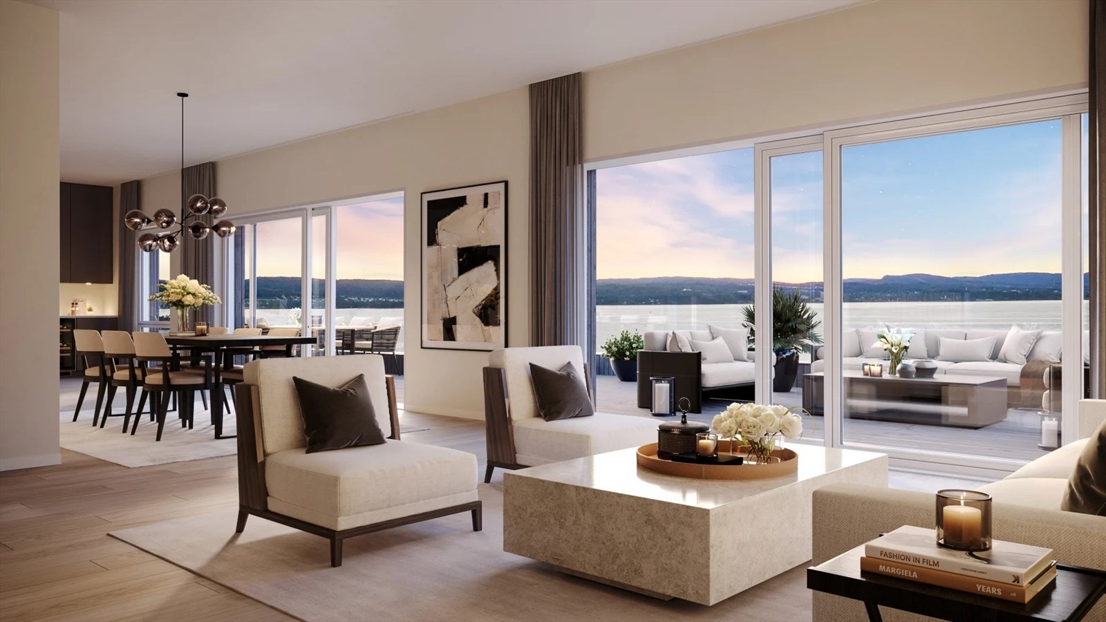 Leiligheten ligger helt i front med stor takterrasse mot sjøen. Galleribilde