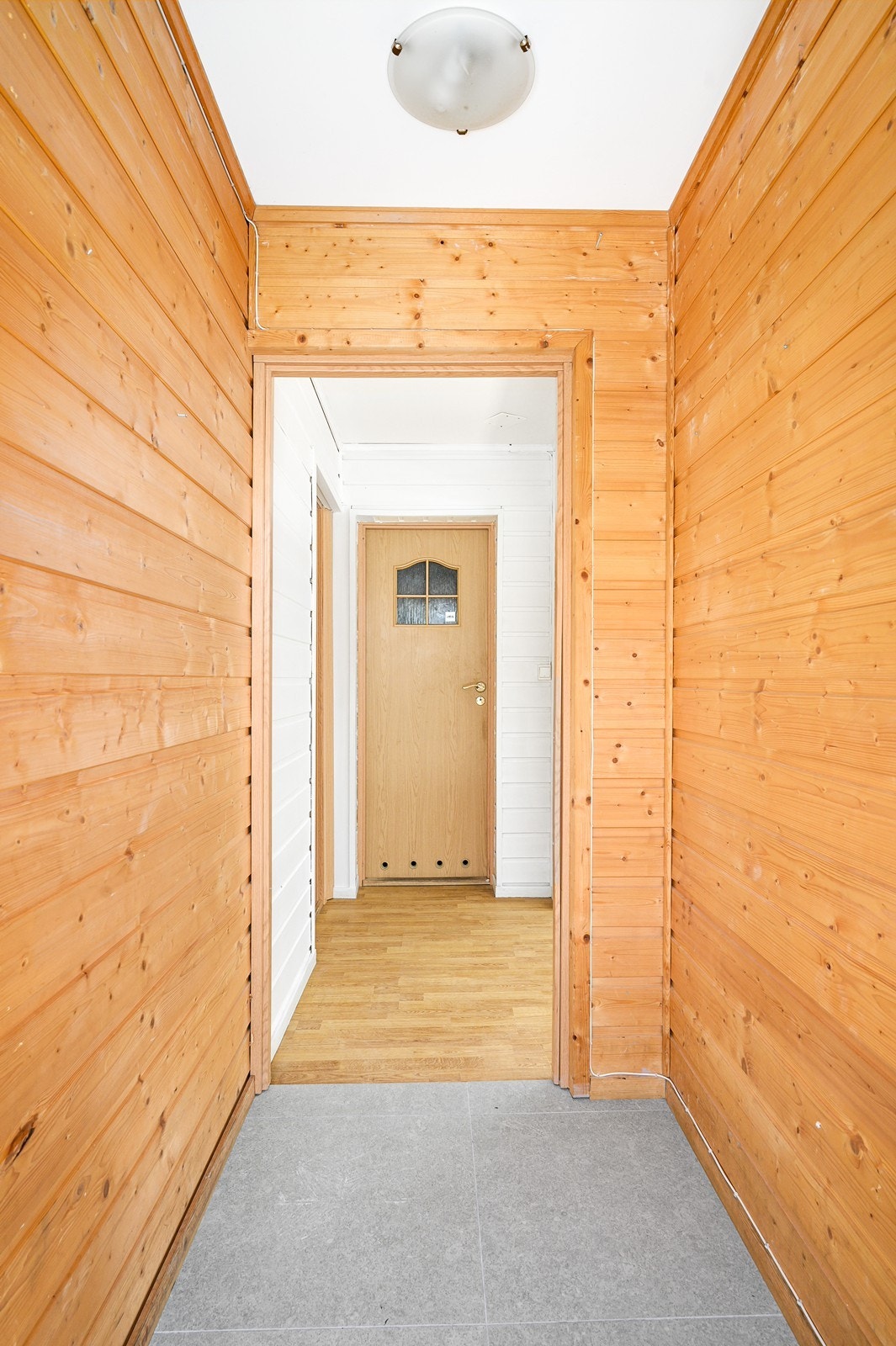 Gang/entré med flislagt gulv Galleribilde