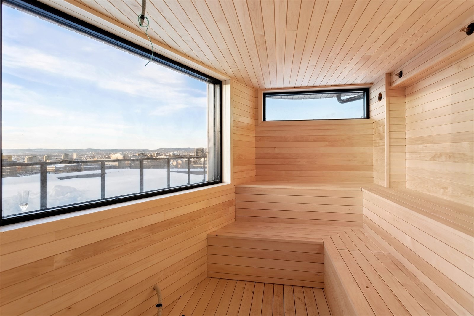 På byggenes fire takterrasser har du tilgang til sauna i "Damphuset" Galleribilde