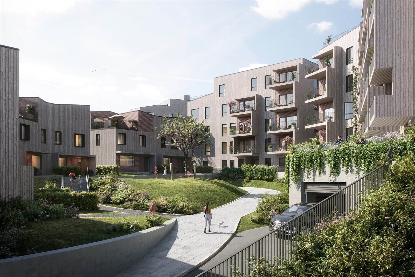 Innkjøring til garasje med heisadkomst direkte opp til leilighetene. Galleribilde