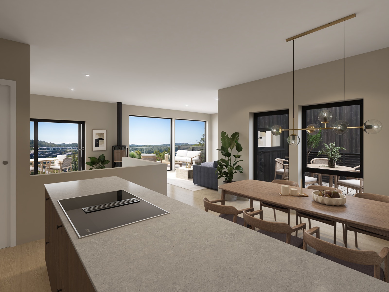 Luftig stue og kjøkken med store vinduer, flott utsikt, ekstra takhøyde gir følelsen av gode rom Galleribilde