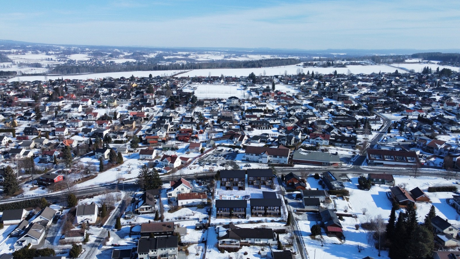 Oversiktsbilde Sollivegen 1 med illustrasjon av prosjektet i front Galleribilde