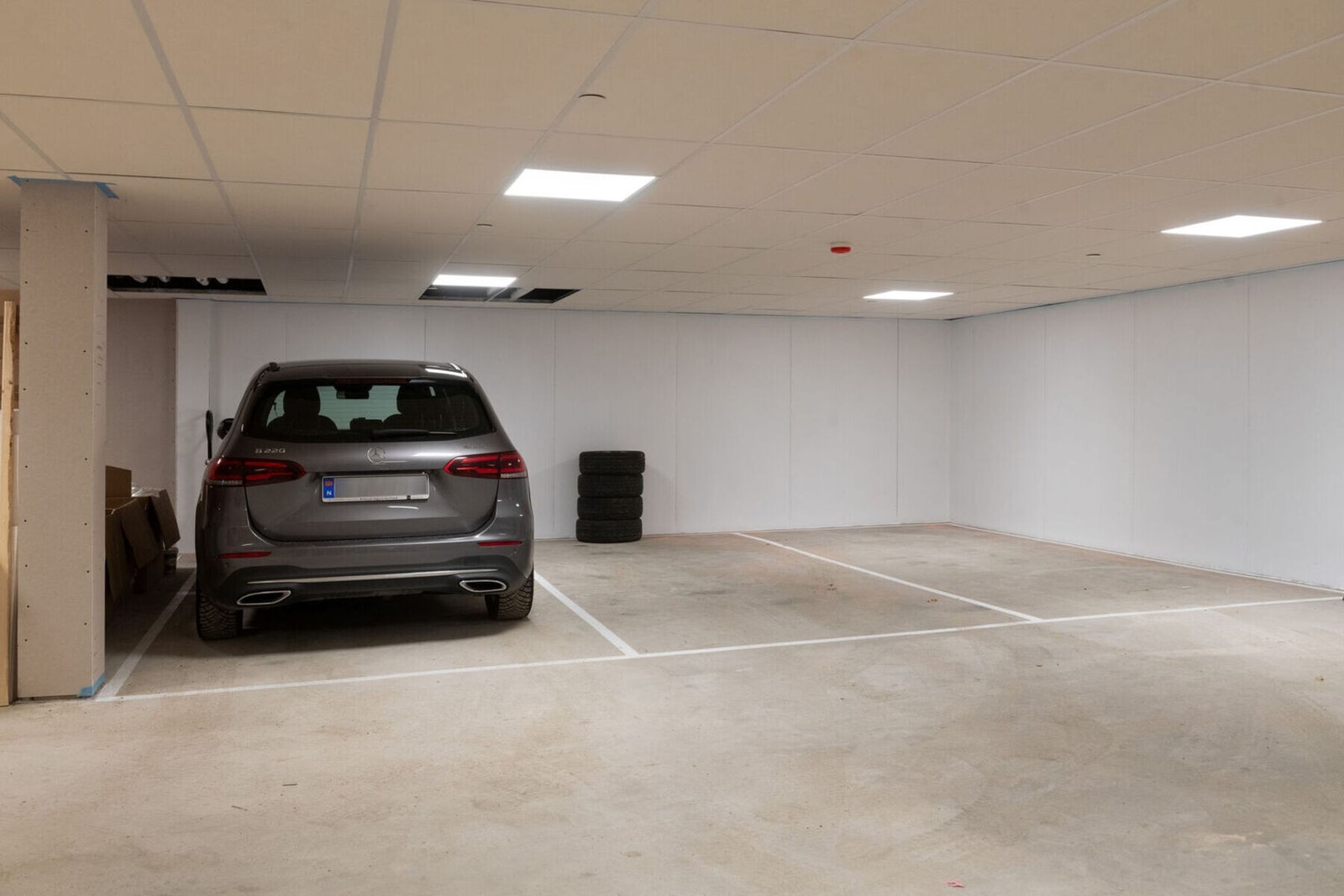 Garasjeanlegget er oppvarmet, så i «Bo i Sentrum» kan du ha snø- og isfri bil året rundt. Galleribilde