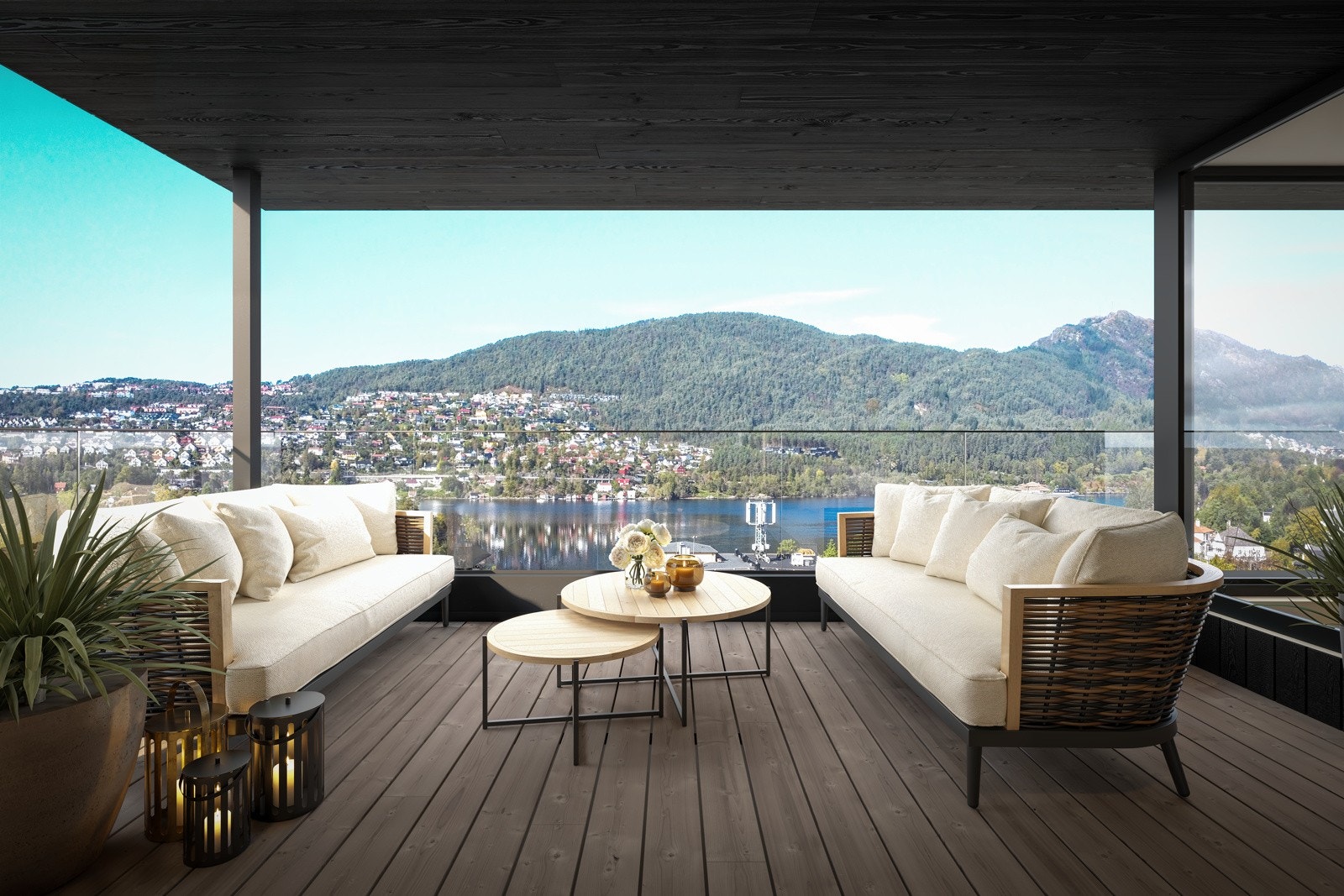 Sør- og vestvendt altan med utgang fra stuen. Overbygd, så den kan brukes hele året gjennom. Utsikt ned mot Nordåsen. Galleribilde