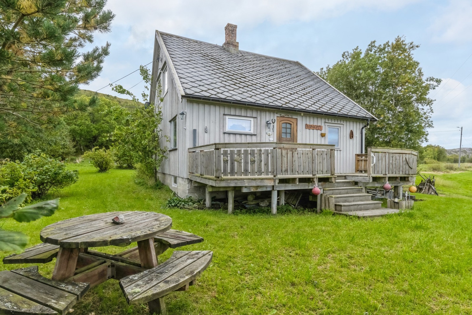 Flat og frodig tom med lang solgang. Galleribilde