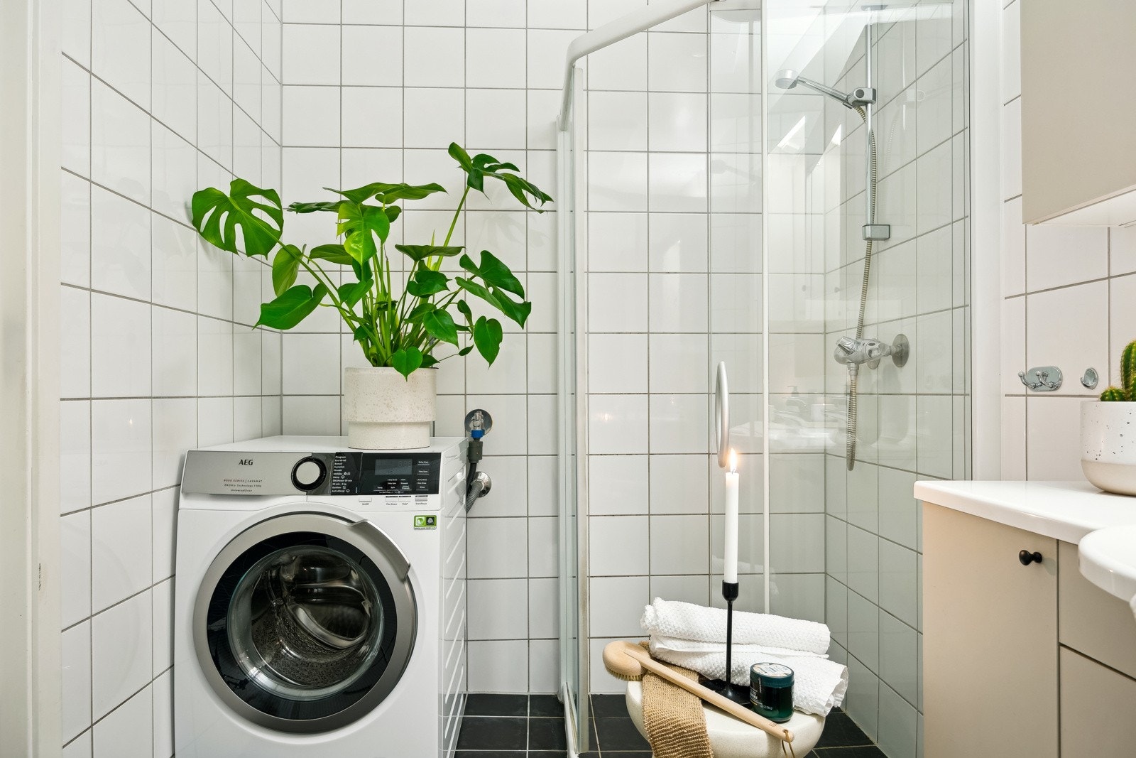 Badet har opplegg for vaskemaskin. Galleribilde