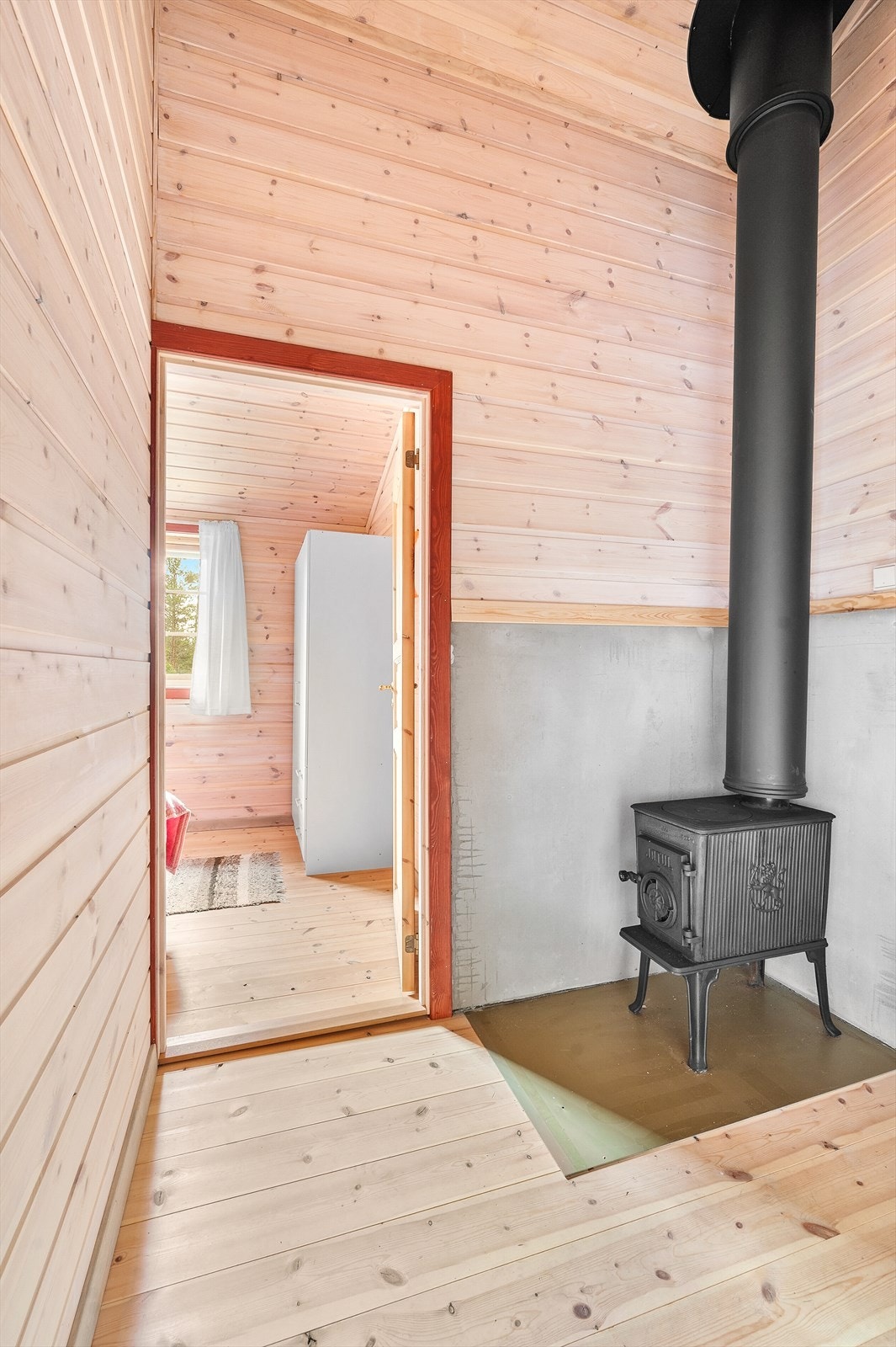 Mellomgang med vedovn Galleribilde