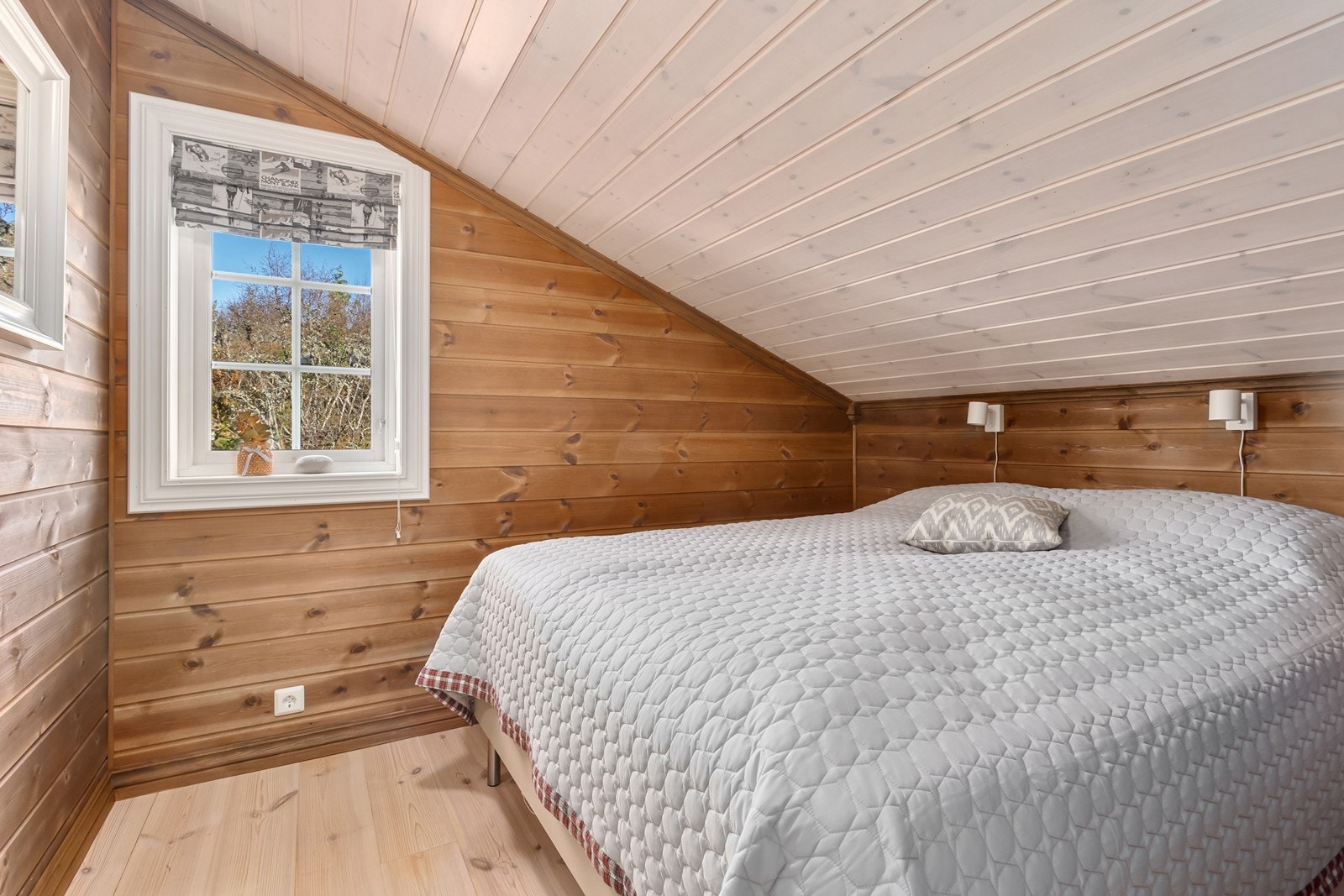 Rommet utstråler en behagelig atmosfære for avslapning og hvile. Galleribilde