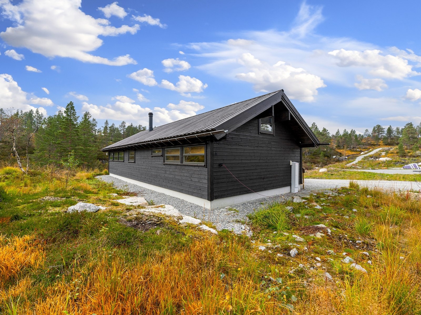 Hyttefeltet har klart å beholde store deler av det naturlige terrenget rundt. Galleribilde