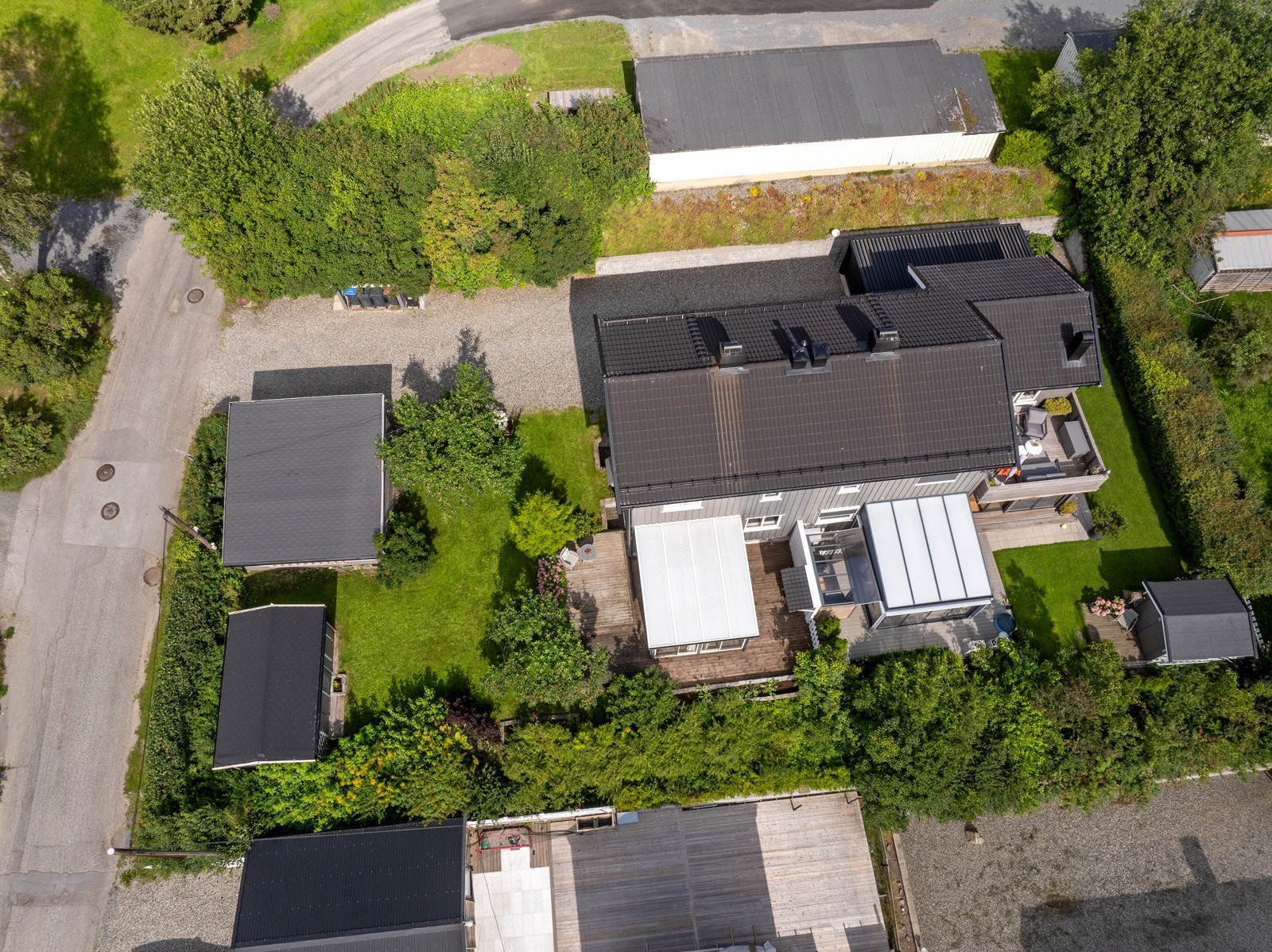 Perspektivbilde av eiendommen. Enheten ligger lengst mot nord. Galleribilde